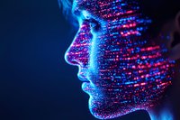 Profile view of digital face dissolving into glowing blue and pink particle effects against dark background, representing artificial intelligence and technology.