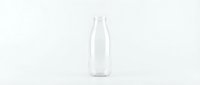 Empty clear glass bottle isolated on white background for product mockup and packaging design projects.