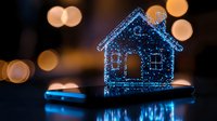 Glowing blue digital house hologram floating above smartphone with bokeh lights background, representing smart home technology and digital real estate concept.