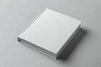 Blank white hardcover book mockup on gray background for branding and design presentation projects.