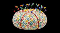 Colorful pincushion with multicolored pins isolated on transparent background, ready for craft, sewing, and design projects including t-shirts, clipart, and print-on-demand products.
