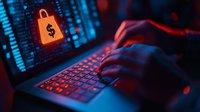 Cybersecurity concept with glowing padlock and dollar sign. Hands typing on illuminated keyboard in dark room with binary code background. Digital security threat.