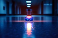 Glowing laboratory flask with purple liquid emits mysterious light in dark corridor, creating dramatic reflections on wet floor. Science research concept.
