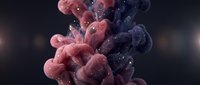 Abstract fluid art with pink and dark blue ink clouds mixing in water creating organic flowing shapes with bubbles and dynamic movement.