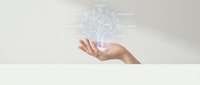 Hand holding glowing digital tree hologram representing growth, technology innovation, environmental sustainability and future business development concepts.