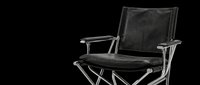 Black camping chair with metal frame and fabric seat, isolated on transparent background, ready for t-shirt design, clipart, stickers, and print-on-demand products.