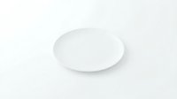 Empty white ceramic plate isolated on white background for food presentation and culinary design projects.