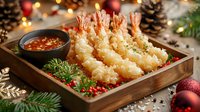 Crispy tempura shrimp served in wooden tray with spicy dipping sauce, garnished with fresh herbs and cranberries against festive Christmas background with pine cones and ornaments.