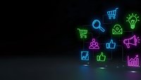 Glowing neon business and marketing icons floating on dark background for digital commerce presentations and corporate design projects.