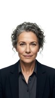 Professional mature woman with curly gray hair in business suit smiling confidently on white background isolated for corporate design use.
