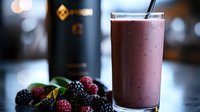 Smoothie drink with fresh berries and blurred background, perfect for beverage, health, nutrition, and lifestyle marketing materials.
