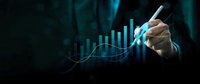 Businessman hand drawing upward trending graph with glowing blue data visualization charts showing financial growth and market analysis success.