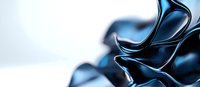 Elegant dark blue silky fabric with smooth waves and folds creating dramatic light and shadow effects against white background, suitable for luxury fashion backgrounds.