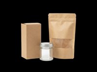Kraft paper packaging set with box, stand-up pouch, and glass jar, isolated on transparent background, ready for T-shirt, sticker, and print on demand use.