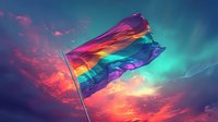 Vibrant rainbow flag waving against dramatic sunset sky with aurora borealis colors, flowing fabric catching wind in magical twilight atmosphere.