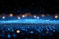 Magical blue glitter background with golden bokeh lights and sparkling particles against dark night sky with stars, creating dreamy festive atmosphere.