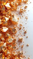 Shimmering gold leaf flakes and fragments scattered on white background creating luxurious metallic texture for premium design projects and elegant decorations.