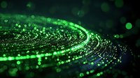 Glowing green particles and light trails creating dynamic spiral motion against dark background with bokeh effect and digital energy flow pattern.
