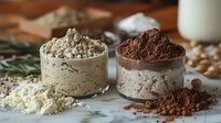 Protein powder scoops with vanilla and chocolate flavors on rustic wooden surface, scattered powder and ingredients for sports nutrition supplements.