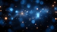 Magical blue and orange bokeh lights scattered across dark space background with glowing particles and sparkles create dreamy cosmic atmosphere.
