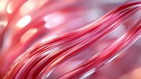 Flowing red and pink abstract waves create dynamic motion against soft blurred background. Modern design element for creative projects and presentations.