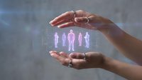 Human hands protecting holographic business team figures with digital interface elements representing corporate care and employee protection concepts.