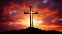 Wooden cross silhouette against dramatic sunset sky with orange and purple clouds on hilltop for religious and spiritual themes.