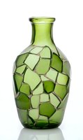 Green mosaic glass vase with geometric pattern isolated on white background for home decor and interior design projects.