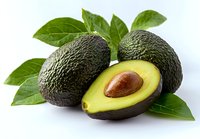 Fresh ripe avocados with green leaves on white background, healthy organic fruit for cooking, nutrition and diet concepts, isolated for design use.