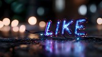 Glowing blue LED word "LIKE" on dark surface with bokeh lights in background creating social media concept atmosphere.
