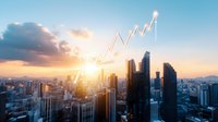 Glowing upward arrow chart over modern cityscape at sunset, symbolizing business growth and financial success against urban skyline background.