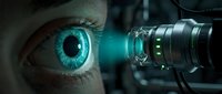 Young adult with striking turquoise eyes undergoing advanced eye examination using digital retinal imaging technology for ophthalmology, optometry, vision testing, and medical diagnostics.