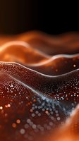 Abstract digital wave pattern with glowing orange particles and dots forming dynamic flowing surface against dark background, suitable for tech designs.