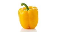 Fresh yellow bell pepper with green stem isolated on white background, suitable for food, cooking, nutrition, and healthy eating design projects.