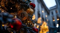 Golden bitcoin cryptocurrency coin hanging as Christmas tree decoration among red baubles and lights, festive holiday crypto theme background.