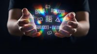 Male hands holding glowing neon language symbols and text including bonjour, subject, and event icons, representing multilingual communication and international learning concepts.