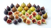 Fresh figs collection with whole and sliced fruits showing red flesh interior on white background. Organic Mediterranean produce for healthy eating.