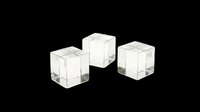 Three clear glass crystal cubes isolated on transparent background, ready for stickers, print on demand, sublimation, T-shirt design, and clipart use.