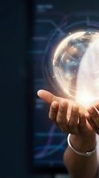 Hand holding glowing digital globe with holographic earth map and network connections, representing global technology, data communication, and worldwide business innovation.