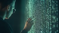 Young Asian male programmer in glasses examining digital code matrix on virtual screen, dramatic green cybersecurity lighting effect for technology concept.