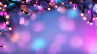 Glowing string lights on dark background with dreamy pink and blue bokeh effect creating magical festive atmosphere for holiday designs and celebrations.