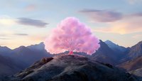 Glowing pink cherry blossom tree atop mountain peak against dramatic sunset sky and mountain range silhouettes creates mystical fantasy landscape.