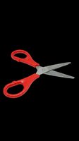 Red scissors with gray stainless steel blades isolated on transparent background, ready for clipart, t-shirt design, print-on-demand products, stickers, and sublimation projects.
