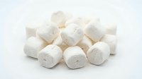 Soft white marshmallows isolated on clean background, ready for design projects, packaging mockups, food photography, and commercial advertising applications.