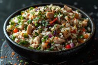 Fresh rice pilaf with mushrooms, colorful bell peppers, green peas and herbs in black cast iron bowl on dark wooden background, close up view.