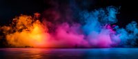 Vibrant multicolored smoke explosion with orange, pink and blue hues creating dramatic atmospheric effect on dark background for creative projects.