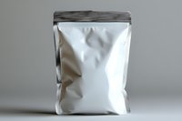 White blank foil food packaging pouch with zipper closure on gray background, mockup for product design and branding presentation.