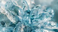 Ethereal macro photography of frozen ice crystals in light blue tones with delicate formations and sparkling bokeh effects creating an abstract winter wonderland scene.