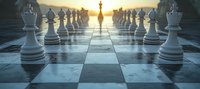 Chess pieces on board at sunset with dramatic lighting, white pawns facing golden queen figure in distance on reflective checkered surface. Strategic concept.