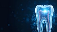 Digital tooth with glowing blue light and network connections on dark background for dental technology and healthcare innovation concepts.